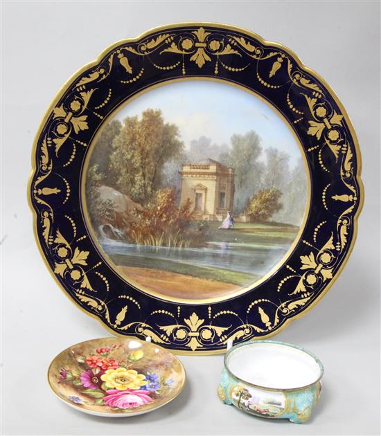 A Sevres cabinet plate, painted with a view titled to underside Pavillon de Musique à Trianon, diam. 24cm